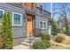 A close-up of an exterior with stairs leading to the front door and a small garden at 2036 Bixby Byway Se Dr, Atlanta, GA 30317