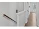 Upstairs hallway with hardwood floors and open doors at 2036 Bixby Byway Se Dr, Atlanta, GA 30317