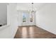 Bright and airy living room with hardwood floors and modern lighting at 2036 Bixby Byway Se Dr, Atlanta, GA 30317