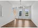 Bright and airy living room with hardwood floors and modern lighting at 2036 Bixby Byway Se Dr, Atlanta, GA 30317