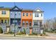 Charming townhomes with colorful exterior and lovely landscaping in a well-maintained neighborhood at 2036 Bixby Byway Se Dr, Atlanta, GA 30317