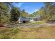Beautiful home with a circular driveway and an attached two-car garage at 3960 Mason Creek Rd, Winston, GA 30187