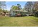 View of a home with covered walkway, brick terrace and garden at 3960 Mason Creek Rd, Winston, GA 30187