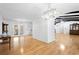Spacious open living room with bright lighting and hardwood floors at 3960 Mason Creek Rd, Winston, GA 30187