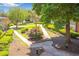 Charming courtyard view featuring manicured landscaping and tranquil walkways surrounded by mature trees at 5200 Peachtree Rd # 3324, Chamblee, GA 30341