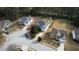 A house with backyard and lush greenery in a suburban neighborhood at 605 Oak Terrace Drive, Covington, GA 30016