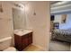This bathroom features a vanity and sink with a toilet next to it at 605 Oak Terrace Drive, Covington, GA 30016
