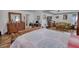 Open concept floor plan: bedroom flows into a living area and office space at 605 Oak Terrace Drive, Covington, GA 30016