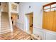 Welcoming entryway with beautiful hardwood floors, stairway, and an open design at 605 Oak Terrace Drive, Covington, GA 30016
