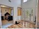 A beautiful entrance area with soaring ceilings, wood-look floors, and a bright, inviting ambiance at 605 Oak Terrace Drive, Covington, GA 30016