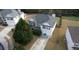 A beautiful two-story home in a suburban neighborhood featuring an attached two-car garage and driveway at 605 Oak Terrace Drive, Covington, GA 30016