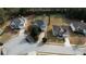 Aerial shot showcases neighborhood homes with ample space and tree coverage at 605 Oak Terrace Drive, Covington, GA 30016