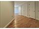 Hallway showcasing wood flooring and white trim at 195 14Th St # 1005, Atlanta, GA 30309