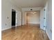 Living room showcasing hardwood floors and multiple entryways at 195 14Th St # 1005, Atlanta, GA 30309