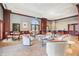 Well-lit lounge area featuring a bar, tables, and comfortable seating at 195 14Th St # 1005, Atlanta, GA 30309