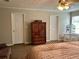 Bright bedroom featuring natural light, closet space, a comfortable bed, and neutral tones to create a peaceful and serene environment at 2814 Michelle Lee Dr, Dacula, GA 30019