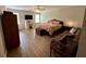 Bright and airy bedroom featuring a large bed, a cozy seating area, and a writing desk, offering comfort and versatility at 2814 Michelle Lee Dr, Dacula, GA 30019