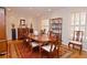 Bright dining room featuring recessed lights, wood floors, furniture and a colorful rug at 4495 Glengary Ne Dr, Atlanta, GA 30342