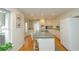 Well-lit kitchen with a center island and hardwood flooring that provides ample counter space and storage at 4495 Glengary Ne Dr, Atlanta, GA 30342