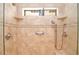 Walk-in tiled shower featuring two shower heads, tiled walls, and a clear glass door at 4495 Glengary Ne Dr, Atlanta, GA 30342