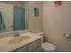 Functional bathroom with vanity sink, mirror, toilet, and shower at 4975 Skyland Pkwy, Cumming, GA 30028