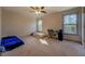Bedroom featuring neutral walls, carpet, and natural light at 4975 Skyland Pkwy, Cumming, GA 30028