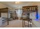 Bedroom with bunk beds, carpet, and curtained window at 4975 Skyland Pkwy, Cumming, GA 30028