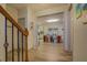 Entryway leading into an open floor plan with dining area and view of the kitchen at 4975 Skyland Pkwy, Cumming, GA 30028