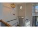Spacious entryway with high ceilings, an oval window, and a staircase at 4975 Skyland Pkwy, Cumming, GA 30028