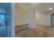 Hallway with built-in shelving and doorways at 4975 Skyland Pkwy, Cumming, GA 30028