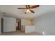 Hallway with a ceiling fan and doorways at 4975 Skyland Pkwy, Cumming, GA 30028