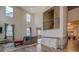 Bright, open-concept living room with soaring ceilings and elegant finishes at 4975 Skyland Pkwy, Cumming, GA 30028