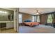 Main bedroom with attached bathroom and many windows at 4975 Skyland Pkwy, Cumming, GA 30028