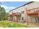Townhome exterior with decks overlooking a shared backyard at 5669 Cobblestone Creek Pl # 12, Mableton, GA 30126