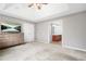 Spacious bedroom with a ceiling fan, a large closet, and an ensuite bathroom with a double vanity at 5669 Cobblestone Creek Pl # 12, Mableton, GA 30126