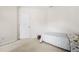 Simple bedroom setup, with carpet, featuring a small bed at 5669 Cobblestone Creek Pl # 12, Mableton, GA 30126