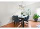 Dining area with modern lighting and a view of the outdoors at 5669 Cobblestone Creek Pl # 12, Mableton, GA 30126