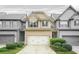 Charming two-story townhome with a well-manicured front yard and attached garage at 5669 Cobblestone Creek Pl # 12, Mableton, GA 30126
