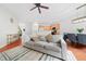 Bright and airy living space with comfortable seating and an adjacent dining area at 5669 Cobblestone Creek Pl # 12, Mableton, GA 30126