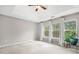 Spacious main bedroom with high ceilings and large windows that let in plenty of natural light at 5669 Cobblestone Creek Pl # 12, Mableton, GA 30126