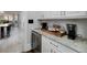 Kitchen nook featuring a wine fridge, coffee maker and granite countertops at 211 Meritage Dr, Alpharetta, GA 30022