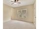 The bedroom offers a ceiling fan and a large window letting in plenty of natural light at 2320 Starr Lake Nw Dr, Acworth, GA 30101