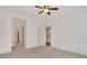 View of a bedroom featuring neutral colored walls, carpet, and a ceiling fan at 2320 Starr Lake Nw Dr, Acworth, GA 30101