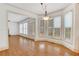Sunlit breakfast nook with hardwood floors, large windows and access to a covered outdoor space at 2320 Starr Lake Nw Dr, Acworth, GA 30101