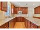 Spacious kitchen featuring granite counters, wood cabinets, and stainless steel appliances at 2320 Starr Lake Nw Dr, Acworth, GA 30101