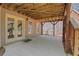 Covered patio with wood beams and French doors at 2320 Starr Lake Nw Dr, Acworth, GA 30101