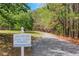 Walking trail for Starr Lake residents, surrounded by trees at 2320 Starr Lake Nw Dr, Acworth, GA 30101