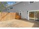 Back deck with wood fence and sliding glass door at 2794 Farmstead Se Rd, Smyrna, GA 30080