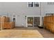 Rear deck featuring wood fencing and sliding glass doors at 2794 Farmstead Se Rd, Smyrna, GA 30080