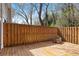 The backyard features a spacious wooden deck, perfect for outdoor entertaining and relaxation at 2794 Farmstead Se Rd, Smyrna, GA 30080